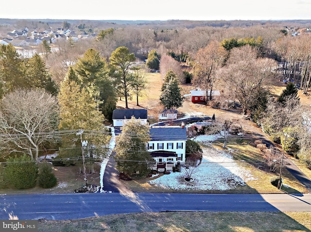 aerial view with a wooded view