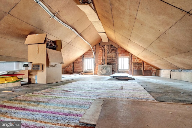 additional living space featuring vaulted ceiling