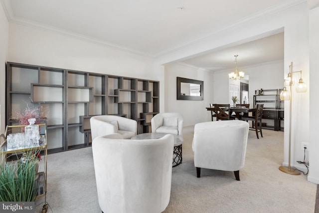 living room with ornamental molding, light colored carpet, and an inviting chandelier