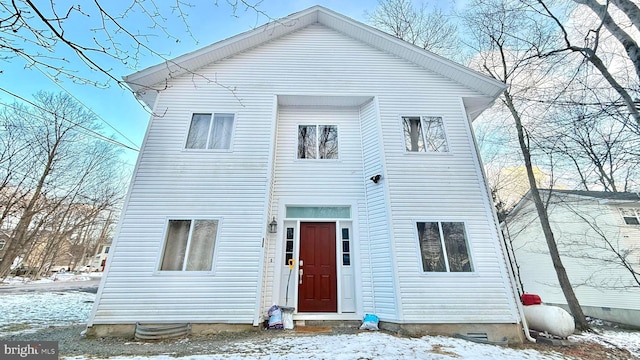 view of snow covered property