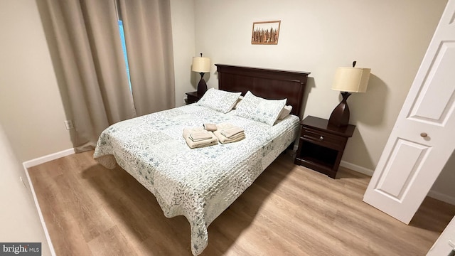 bedroom featuring light hardwood / wood-style floors