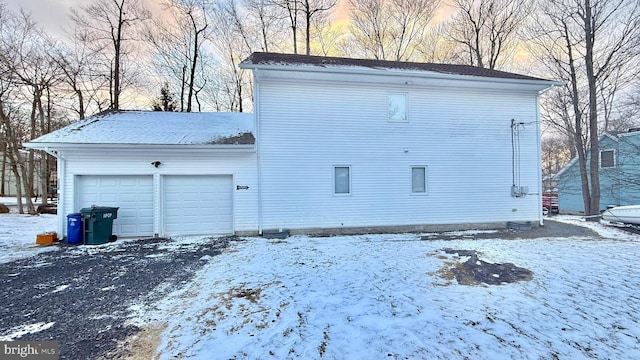 view of snow covered garage