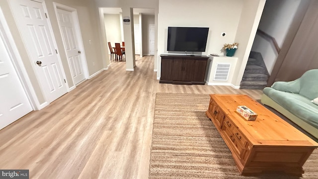 living room featuring light wood-type flooring