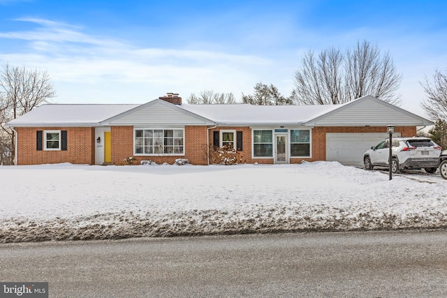 ranch-style home with a garage