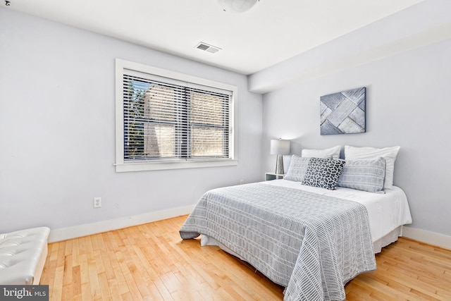 bedroom featuring hardwood / wood-style flooring