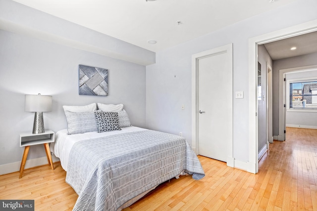 bedroom featuring light hardwood / wood-style flooring