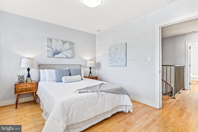 bedroom featuring hardwood / wood-style floors