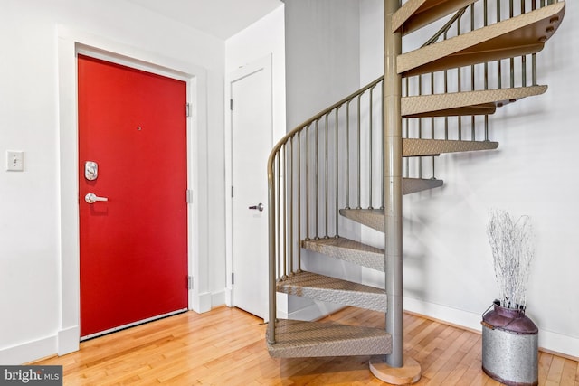 entrance foyer featuring hardwood / wood-style floors