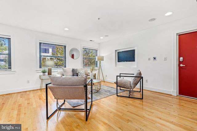 living room with light hardwood / wood-style floors