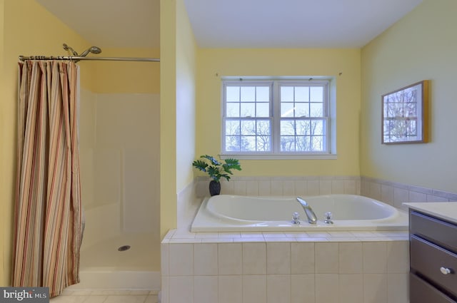 bathroom featuring independent shower and bath and vanity