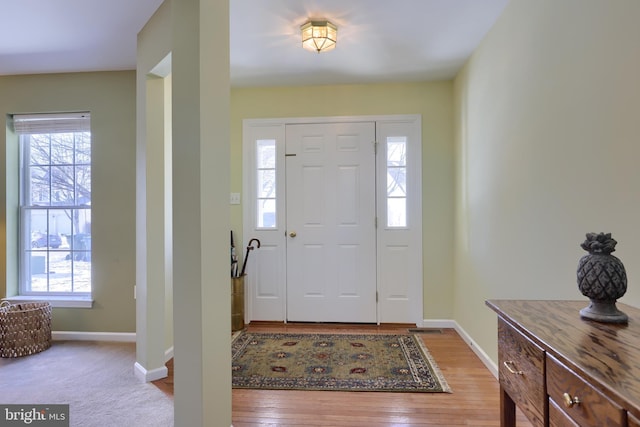 foyer entrance featuring light hardwood / wood-style flooring