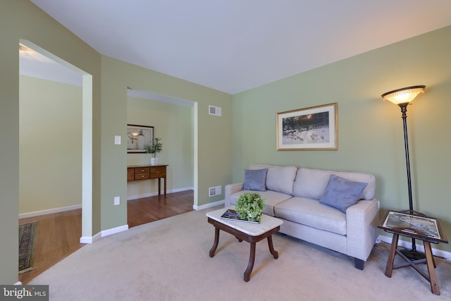 living room featuring light colored carpet