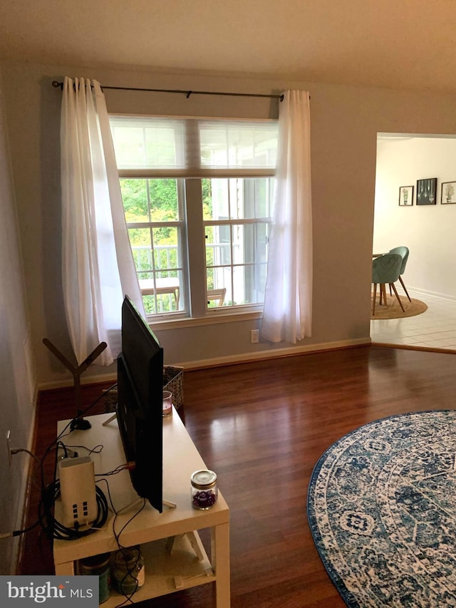 interior space with dark hardwood / wood-style floors