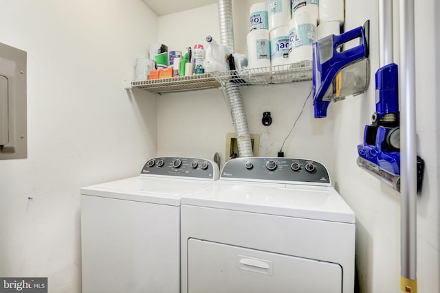 laundry room featuring separate washer and dryer