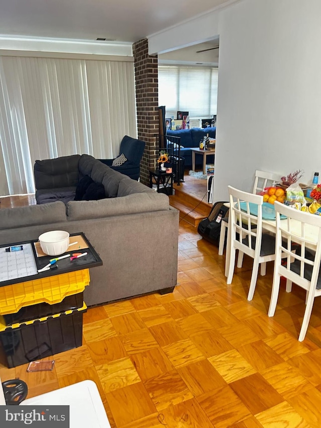 living room featuring parquet flooring