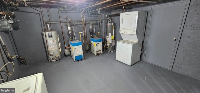 utilities featuring stacked washer / drying machine and gas water heater