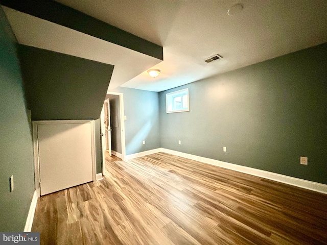 basement with light wood-type flooring