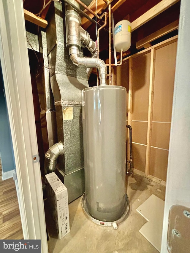 utility room with water heater