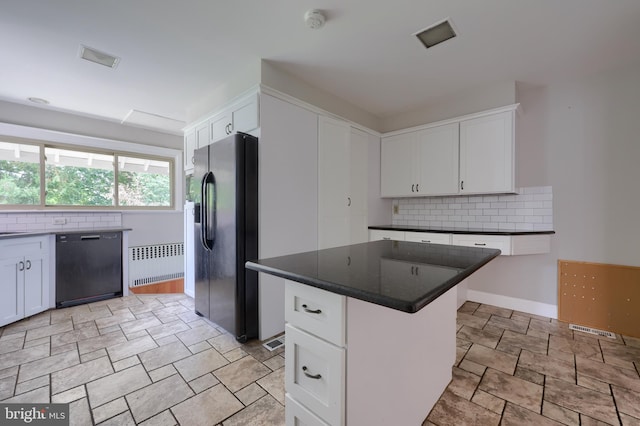 kitchen with radiator, white cabinets, black dishwasher, a kitchen island, and fridge with ice dispenser