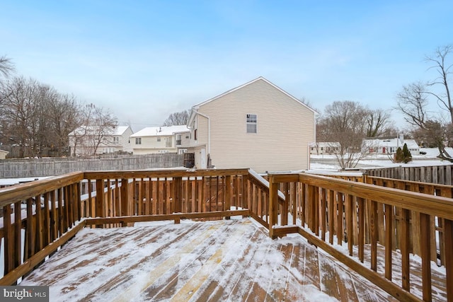 view of snow covered deck