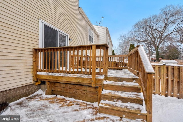 view of snow covered deck