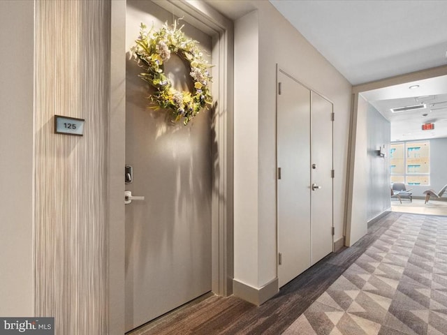 interior space with dark wood-type flooring