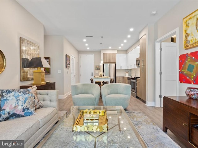 living room featuring light hardwood / wood-style flooring