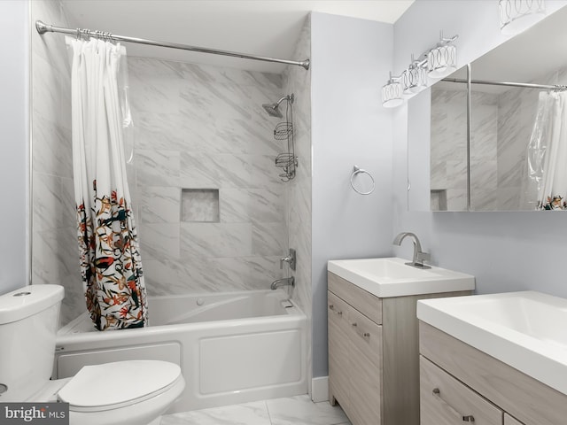 full bathroom featuring vanity, shower / bath combo with shower curtain, and toilet