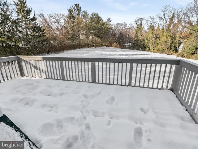 view of snow covered deck