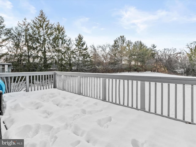 view of snow covered deck