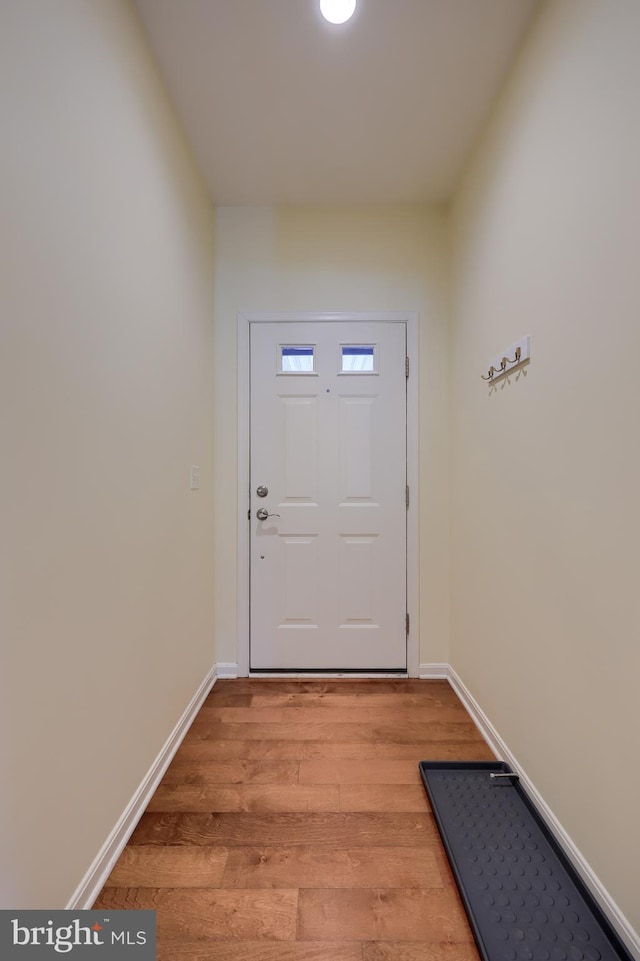 doorway to outside featuring light hardwood / wood-style flooring