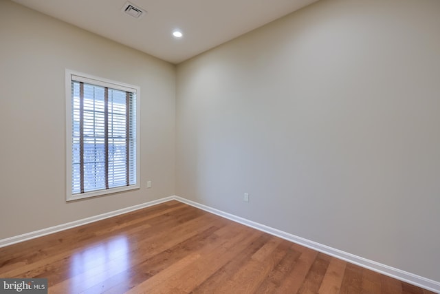 empty room featuring hardwood / wood-style floors