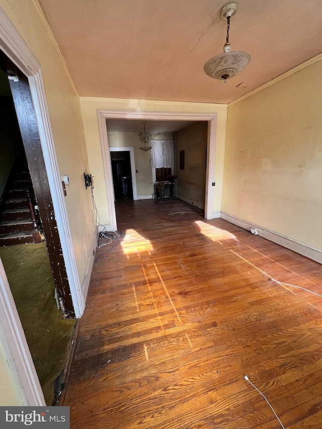 hallway with wood-type flooring