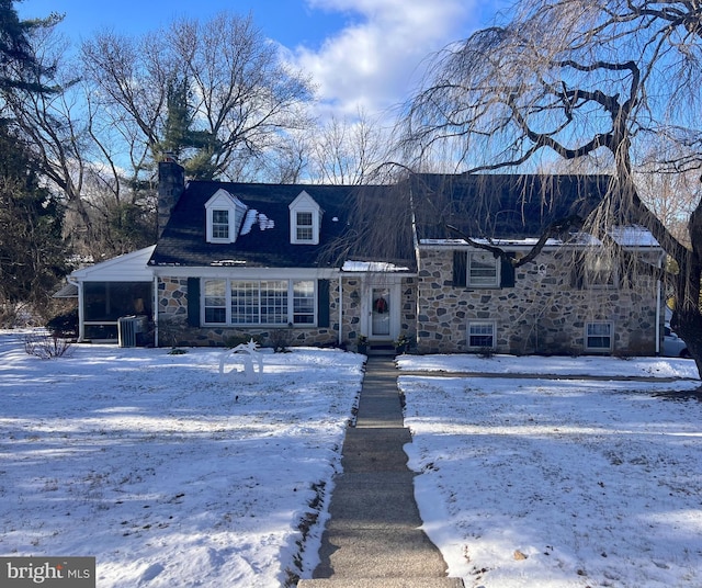 view of front of house featuring central AC