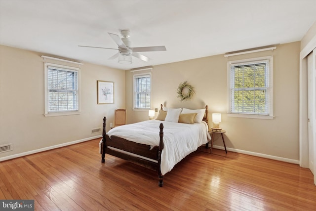 bedroom featuring ceiling fan and hardwood / wood-style flooring