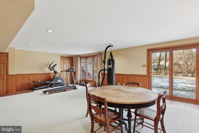 dining room with light colored carpet