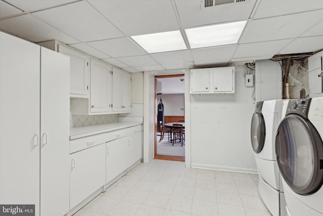 laundry area with cabinets and independent washer and dryer