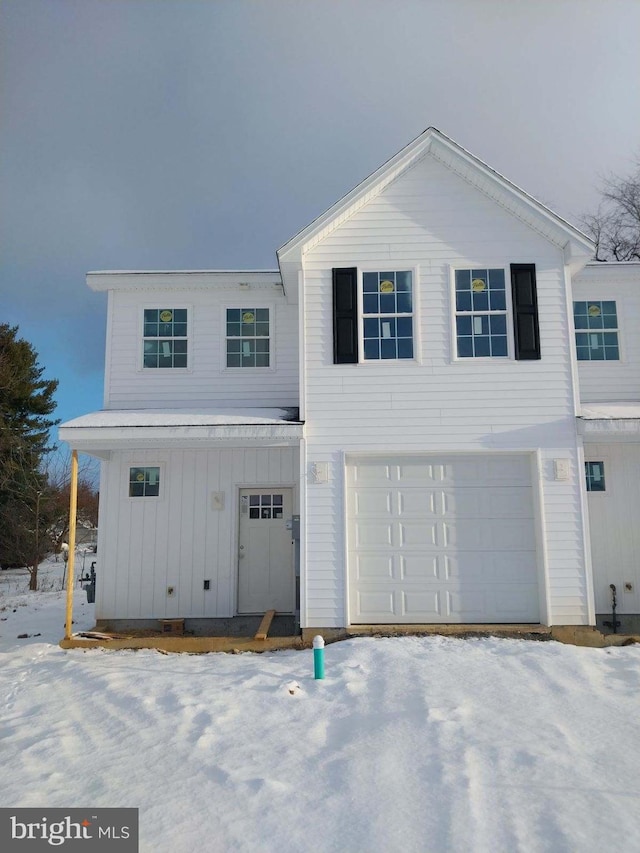 view of front of home with a garage