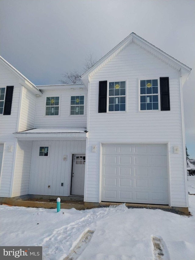 view of front of property featuring a garage