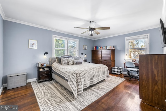 bedroom featuring dark hardwood / wood-style floors, ceiling fan, and ornamental molding