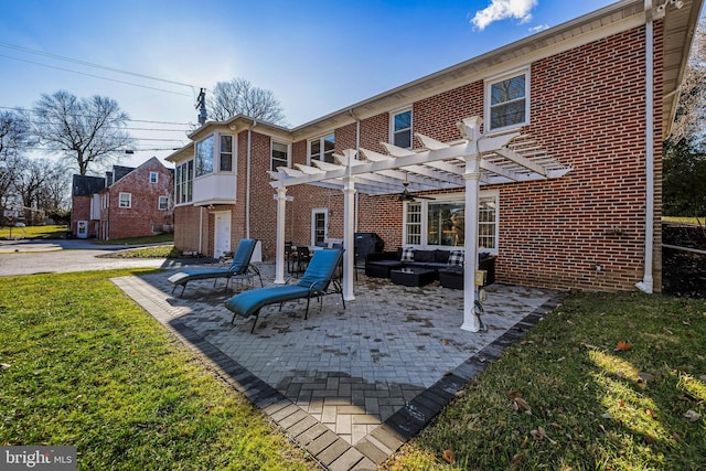 back of house featuring a pergola, an outdoor hangout area, and a lawn