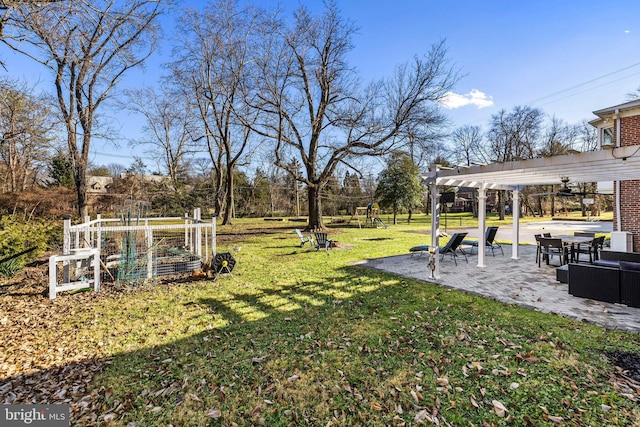 view of yard featuring a pergola and a patio