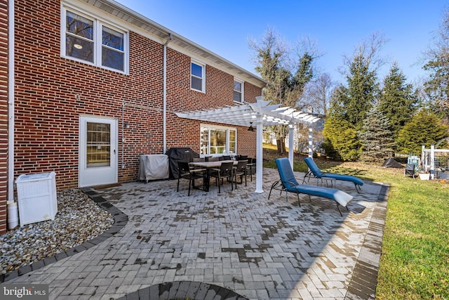 view of patio featuring a pergola and a grill