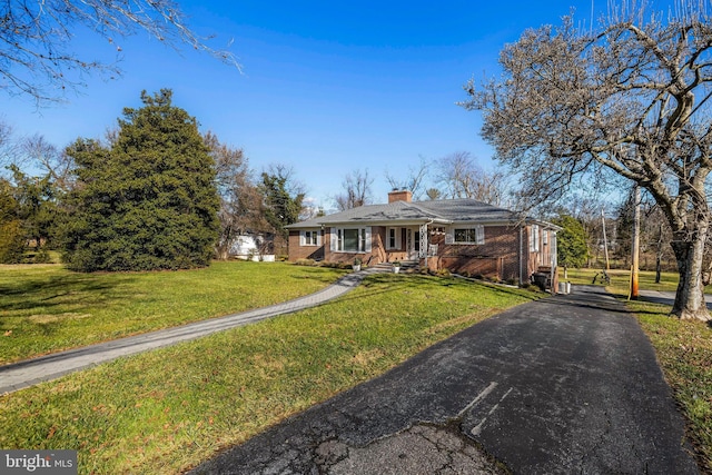 view of front of house with a front yard