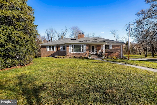 ranch-style house featuring a front yard