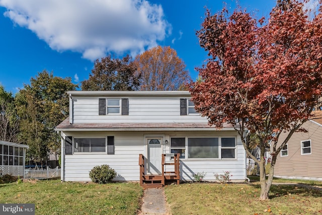 view of front of home with a front yard