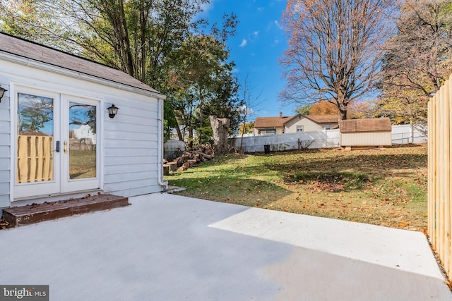 view of patio / terrace with a storage unit