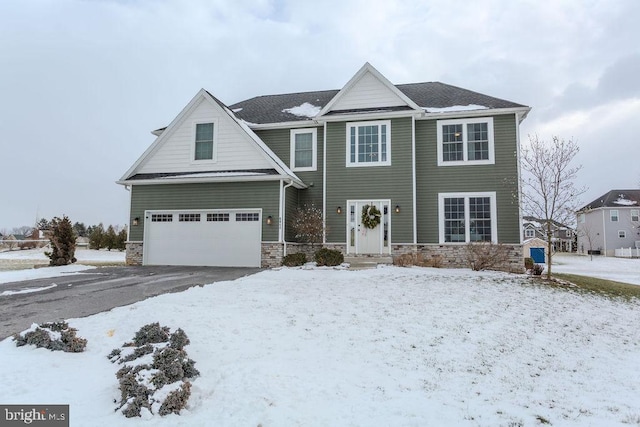 view of front of home with a garage