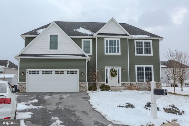 view of front of home with a garage