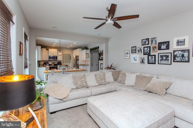 living room with ceiling fan